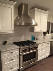 Kitchen with freestanding stove photo