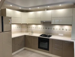 Beige corner kitchen design