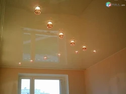 Arrangement of light bulbs on a suspended ceiling photo in the bedroom