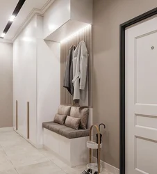 Photo of the interior of the hallway with a wardrobe in light colors
