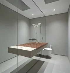 Bathroom with wall-to-wall mirror photo