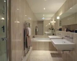 Bathroom With Wall-To-Wall Mirror Photo