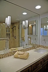 Bathroom with wall-to-wall mirror photo