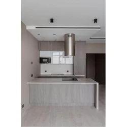Kitchen With Cylindrical Hood Design