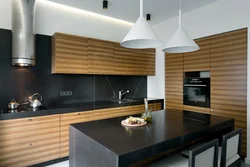 Kitchen with cylindrical hood design