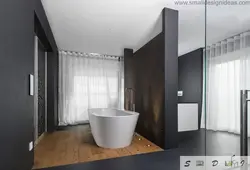 Bathroom design with dark floors and light walls
