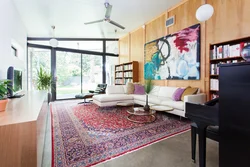 Carpet on the wall in a modern interior in the living room photo