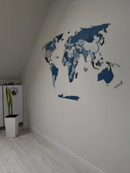 Plaster world map in the living room interior