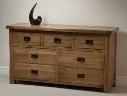 Chest Of Drawers In The Bedroom Made Of Wood Photo