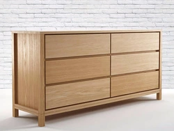 Chest Of Drawers In The Bedroom Made Of Wood Photo