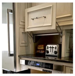 Photo Of A Kitchen With A Microwave In A Niche