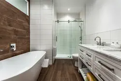 Дизайн ванной с ламинатом на полу