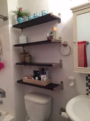 Photograph shelves in the bathroom