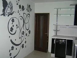 Adhesive wallpaper on the wall in the kitchen photo