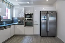 Silver Refrigerator In The Kitchen Interior