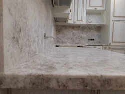 Salamanca marble countertop in the kitchen interior photo