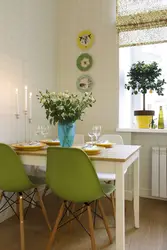 Green chairs in the kitchen interior