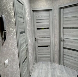 Gray Laminate And Gray Doors In The Interior Of The Apartment