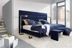 Blue bed in the bedroom photo