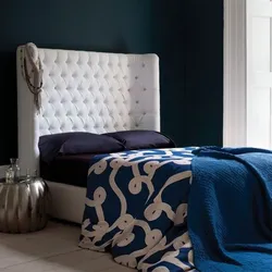 Blue bed in the bedroom photo