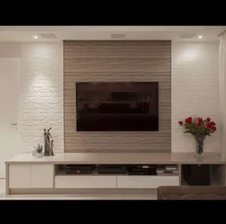 Design of walls in the living room with a TV in the interior