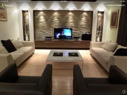 Design of walls in the living room with a TV in the interior
