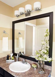 Bathroom mirror photo in the interior