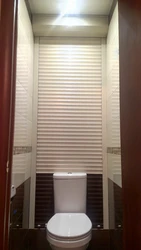 Roller shutters in the bathroom interior photo