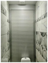 Roller shutters in the bathroom interior photo