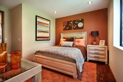 Orange color in the bedroom interior