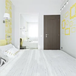 Photo of a bedroom with white laminate