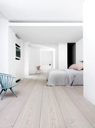 Photo of a bedroom with white laminate