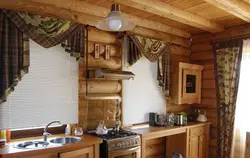 Curtains in the kitchen in a wooden house photo