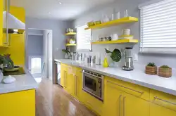Yellow wallpaper in the kitchen in the interior photo