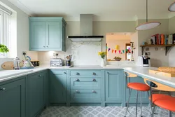 Gray blue kitchen with white photo