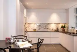 Kitchens with beige tile splashback photo