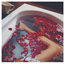 Bath with roses and foam photo
