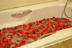 Bath with roses and foam photo