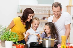 Photo of mom at home in the kitchen