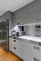 Kitchen with gray refrigerator design