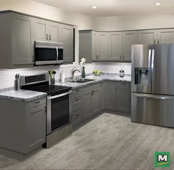 Kitchen with gray refrigerator design