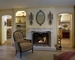 Mirror above the fireplace in the living room interior photo