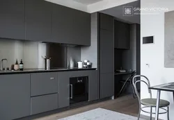 Dark gray kitchen with white photo