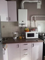 Kitchen design with photo gas boiler and refrigerator