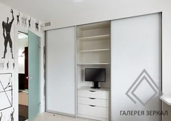 Sliding Wardrobes With A Niche For A TV In The Bedroom Photo