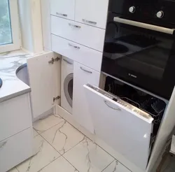 Kitchen in Khrushchev design with refrigerator and dishwasher