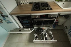 Kitchen in Khrushchev design with refrigerator and dishwasher