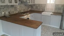 Oak Ceramic Countertop In The Kitchen Interior Photo