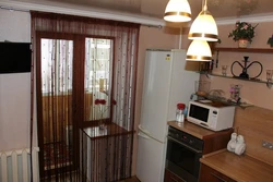 Kitchens without a window with a balcony door photo