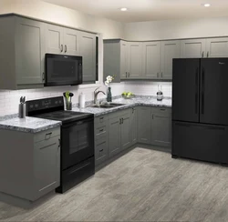 White kitchen with gray refrigerator photo